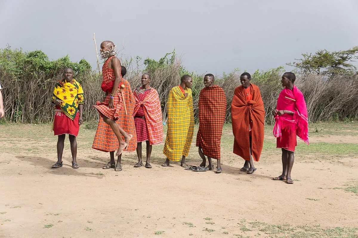 Maasai men dancing at a village visit
