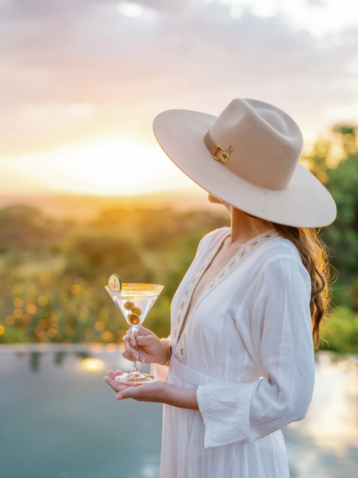 Guest watching the sun set over the bush